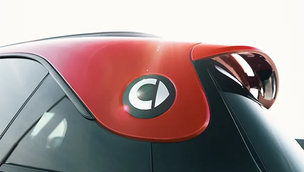 smart #1 in black with red roof back logo