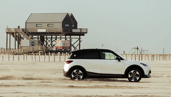 smart #1 brabus on the beach in white