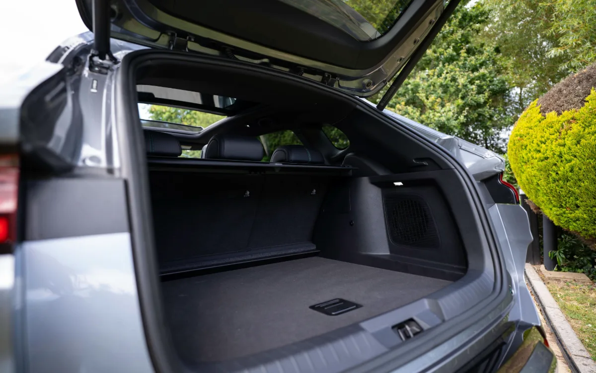 Open rear boot of a modern Dog friendly BYD SUV, showing a spacious cargo area with a parcel shelf and panoramic roof above.